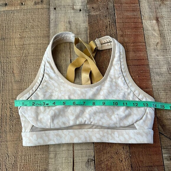 Fabletics Light Beige & White Patterned Sports Bra With Gold Straps - Picture 2 of 6